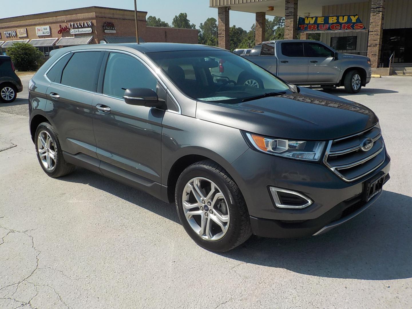 2016 Gray Ford Edge (2FMPK3K99GB) with an Ecoboost engine, Automatic transmission, located at 1617 W Church Street, Livingston, TX, 77351, (936) 327-3600, 30.710995, -94.951157 - What a family vehicle!! Titanium to boot! - Photo#2