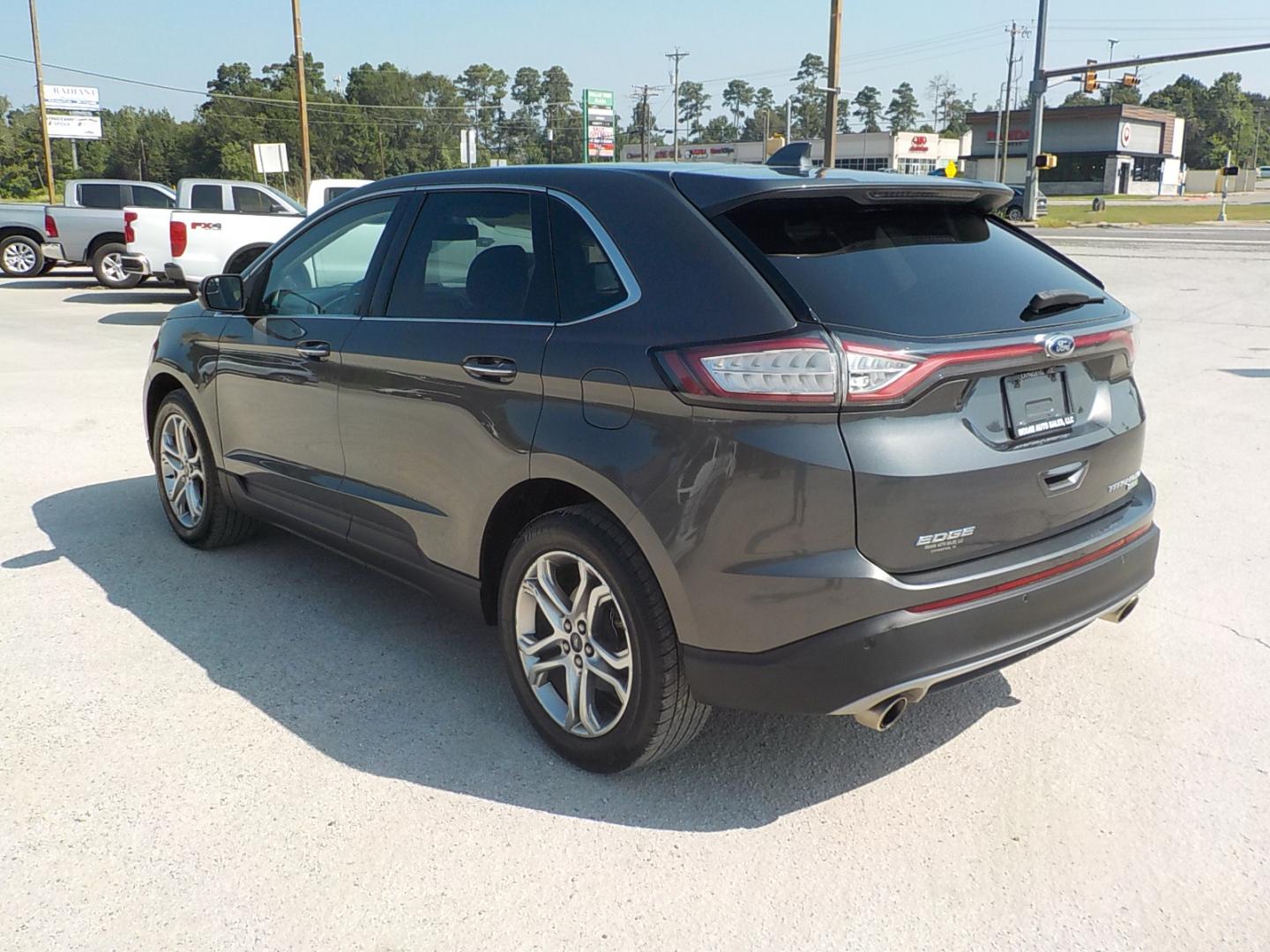 2016 Gray Ford Edge (2FMPK3K99GB) with an Ecoboost engine, Automatic transmission, located at 1617 W Church Street, Livingston, TX, 77351, (936) 327-3600, 30.710995, -94.951157 - What a family vehicle!! Titanium to boot! - Photo#5