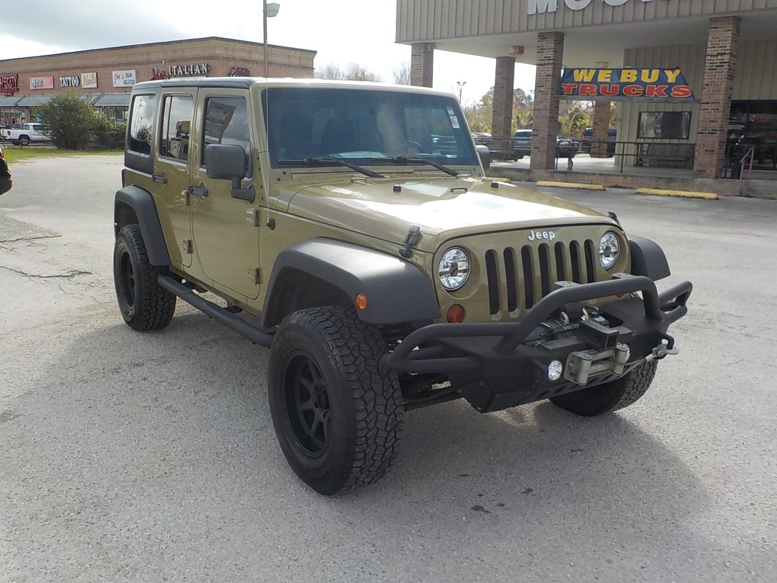 photo of 2011 Jeep Wrangler Unlimited Sport 4WD