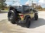 2011 Green Jeep Wrangler Unlimited Sport 4WD (1J4HA3H1XBL) with an 3.8L V6 OHV 12V engine, Automatic transmission, located at 1617 W Church Street, Livingston, TX, 77351, (936) 327-3600, 30.710995, -94.951157 - GOOD LOOKING JEEP!! WHEELS, TIRES, LIFT ALREADY! Good run and drive! - Photo#6