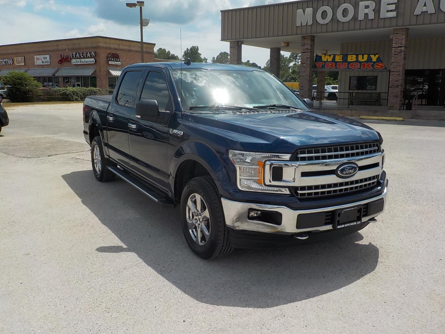 2019 Blue Ford F-150 XLT SuperCrew 5.5-ft. Bed 4WD (1FTEW1E51KK) with an 5.0L V8 OHV 32V engine, 6A transmission, located at 1617 W Church Street, Livingston, TX, 77351, (936) 327-3600, 30.710995, -94.951157 - I LIKE IT!! - Photo#0