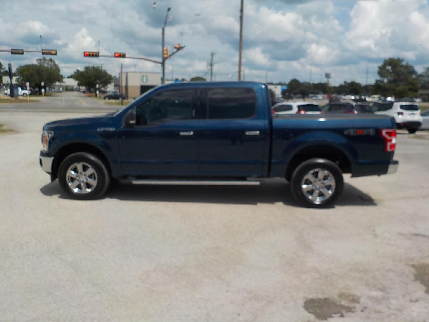 2019 Blue Ford F-150 XLT SuperCrew 5.5-ft. Bed 4WD (1FTEW1E51KK) with an 5.0L V8 OHV 32V engine, 6A transmission, located at 1617 W Church Street, Livingston, TX, 77351, (936) 327-3600, 30.710995, -94.951157 - I LIKE IT!! - Photo#4