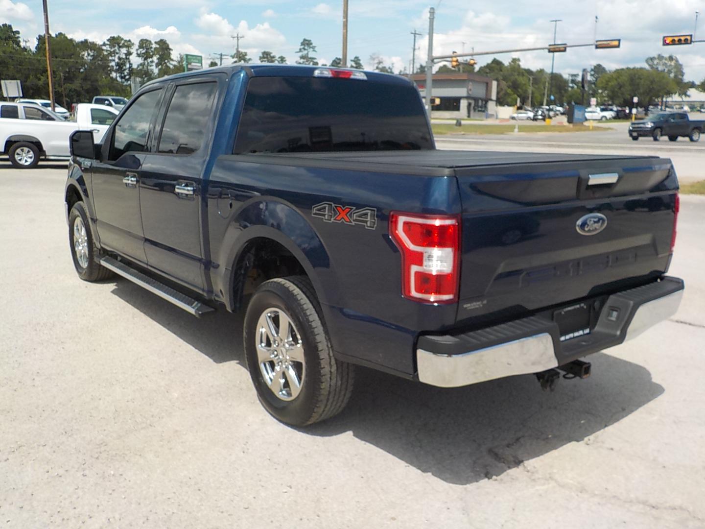 2019 Blue Ford F-150 XLT SuperCrew 5.5-ft. Bed 4WD (1FTEW1E51KK) with an 5.0L V8 OHV 32V engine, 6A transmission, located at 1617 W Church Street, Livingston, TX, 77351, (936) 327-3600, 30.710995, -94.951157 - I LIKE IT!! - Photo#5