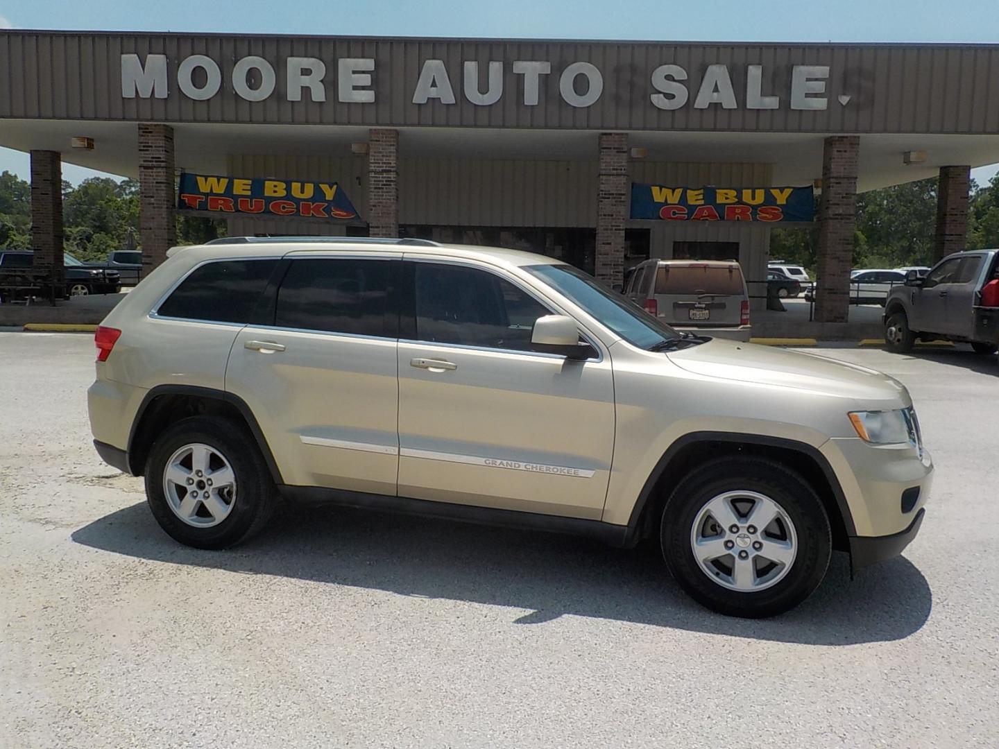 2011 Tan /Dk Gray Jeep Grand Cherokee Laredo 2WD (1J4RS4GG7BC) with an 3.6L V6 DOHC 24V engine, 5-Speed Automatic transmission, located at 1617 W Church Street, Livingston, TX, 77351, (936) 327-3600, 30.710995, -94.951157 - Local vehicle Serviced regularly! Come buy this one with confidence!! - Photo#0