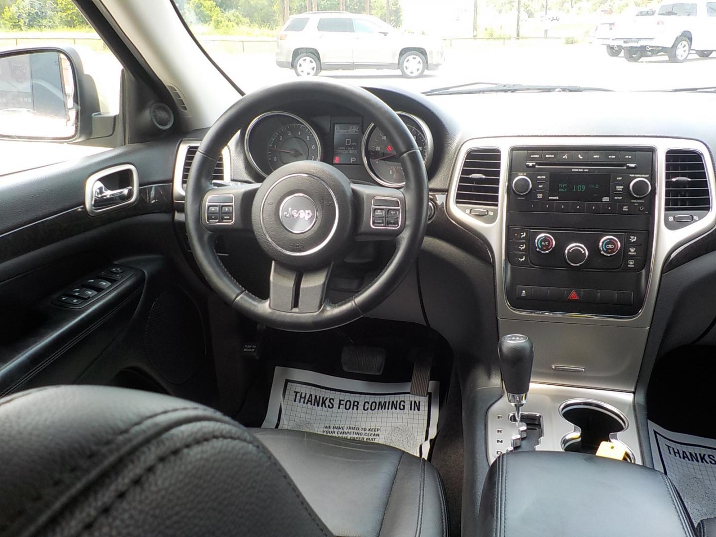 2011 Tan /Dk Gray Jeep Grand Cherokee Laredo 2WD (1J4RS4GG7BC) with an 3.6L V6 DOHC 24V engine, 5-Speed Automatic transmission, located at 1617 W Church Street, Livingston, TX, 77351, (936) 327-3600, 30.710995, -94.951157 - Local vehicle Serviced regularly! Come buy this one with confidence!! - Photo#13