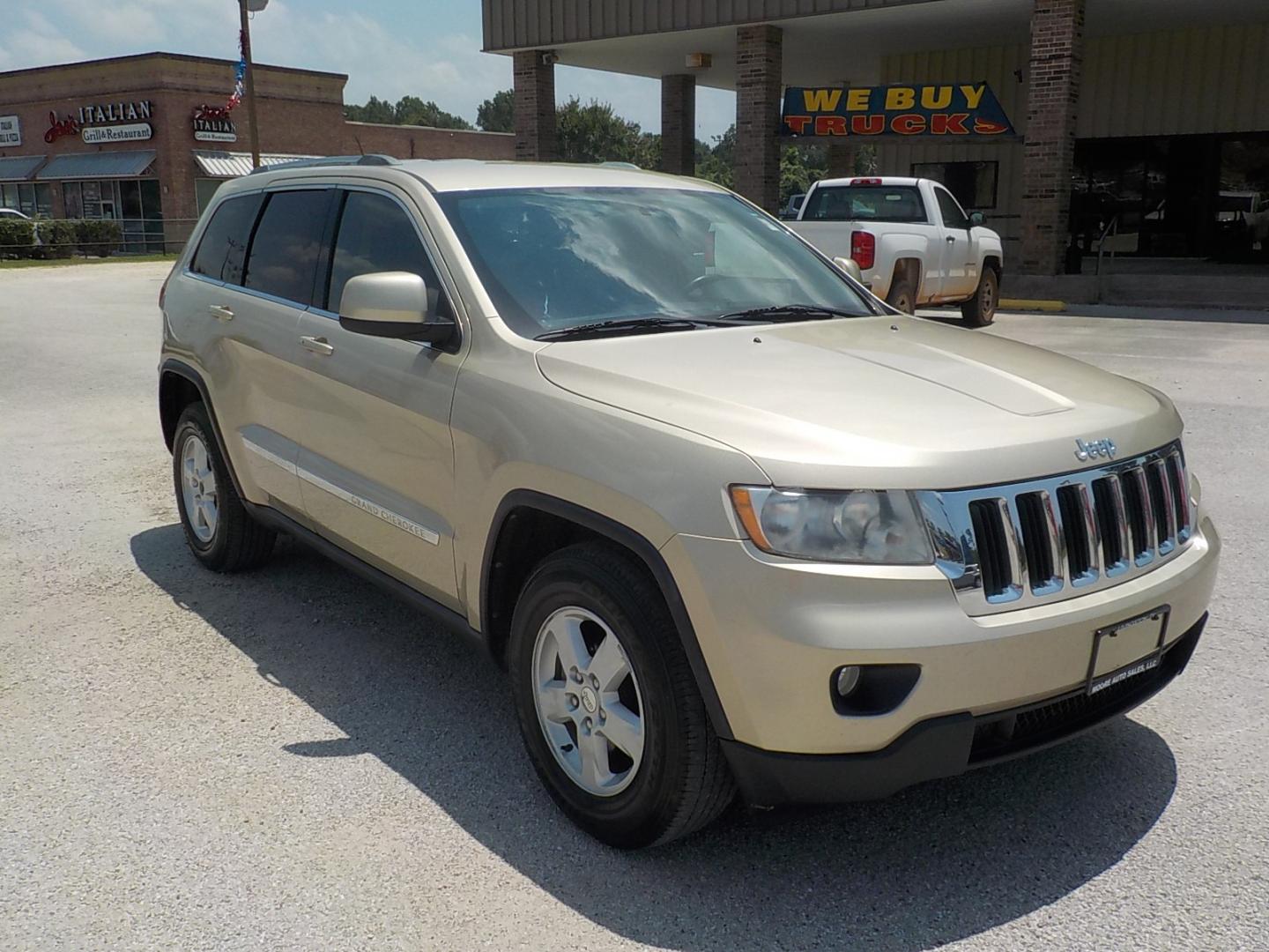 2011 Tan /Dk Gray Jeep Grand Cherokee Laredo 2WD (1J4RS4GG7BC) with an 3.6L V6 DOHC 24V engine, 5-Speed Automatic transmission, located at 1617 W Church Street, Livingston, TX, 77351, (936) 327-3600, 30.710995, -94.951157 - Local vehicle Serviced regularly! Come buy this one with confidence!! - Photo#1