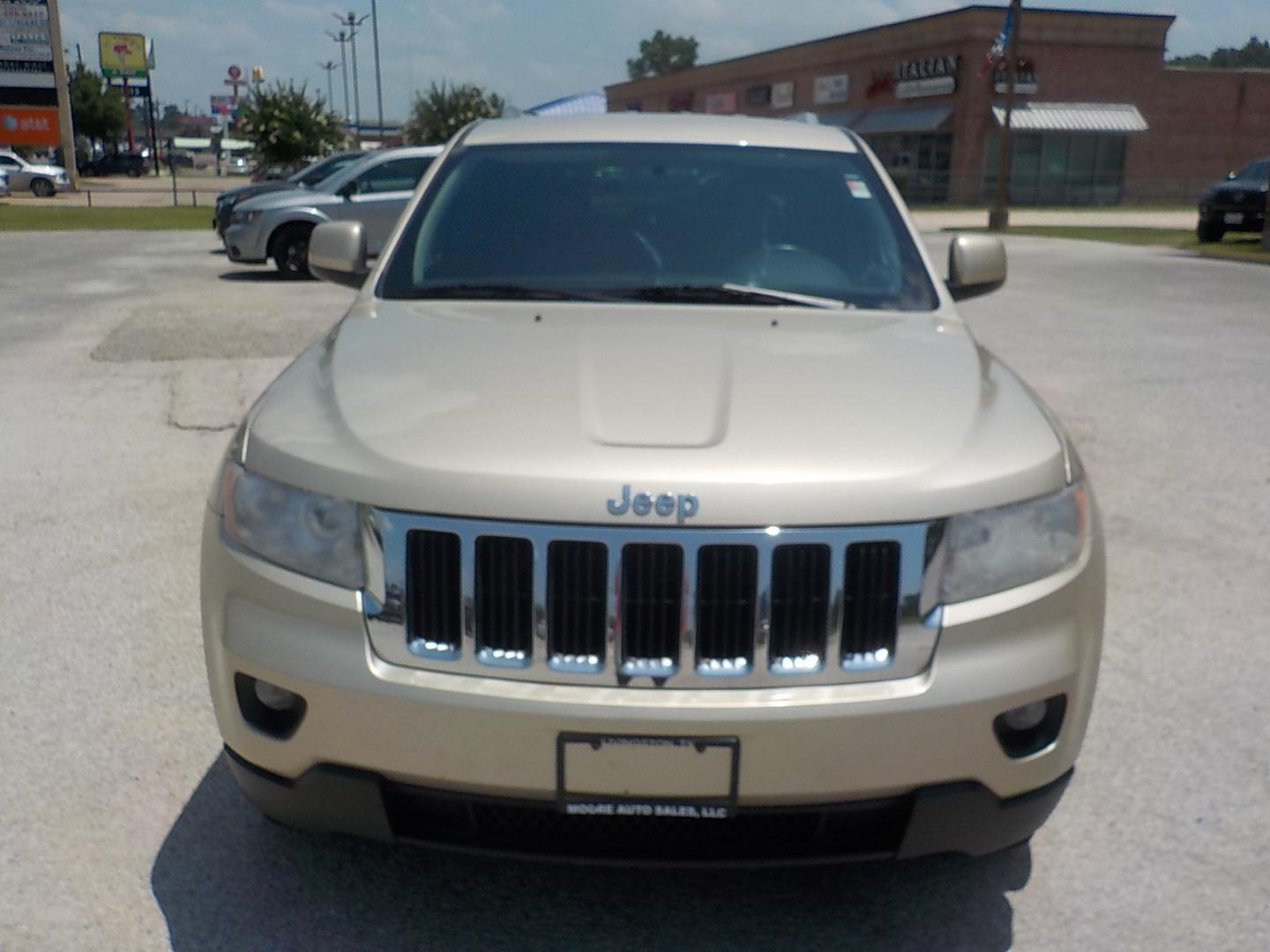 2011 Tan /Dk Gray Jeep Grand Cherokee Laredo 2WD (1J4RS4GG7BC) with an 3.6L V6 DOHC 24V engine, 5-Speed Automatic transmission, located at 1617 W Church Street, Livingston, TX, 77351, (936) 327-3600, 30.710995, -94.951157 - Local vehicle Serviced regularly! Come buy this one with confidence!! - Photo#2