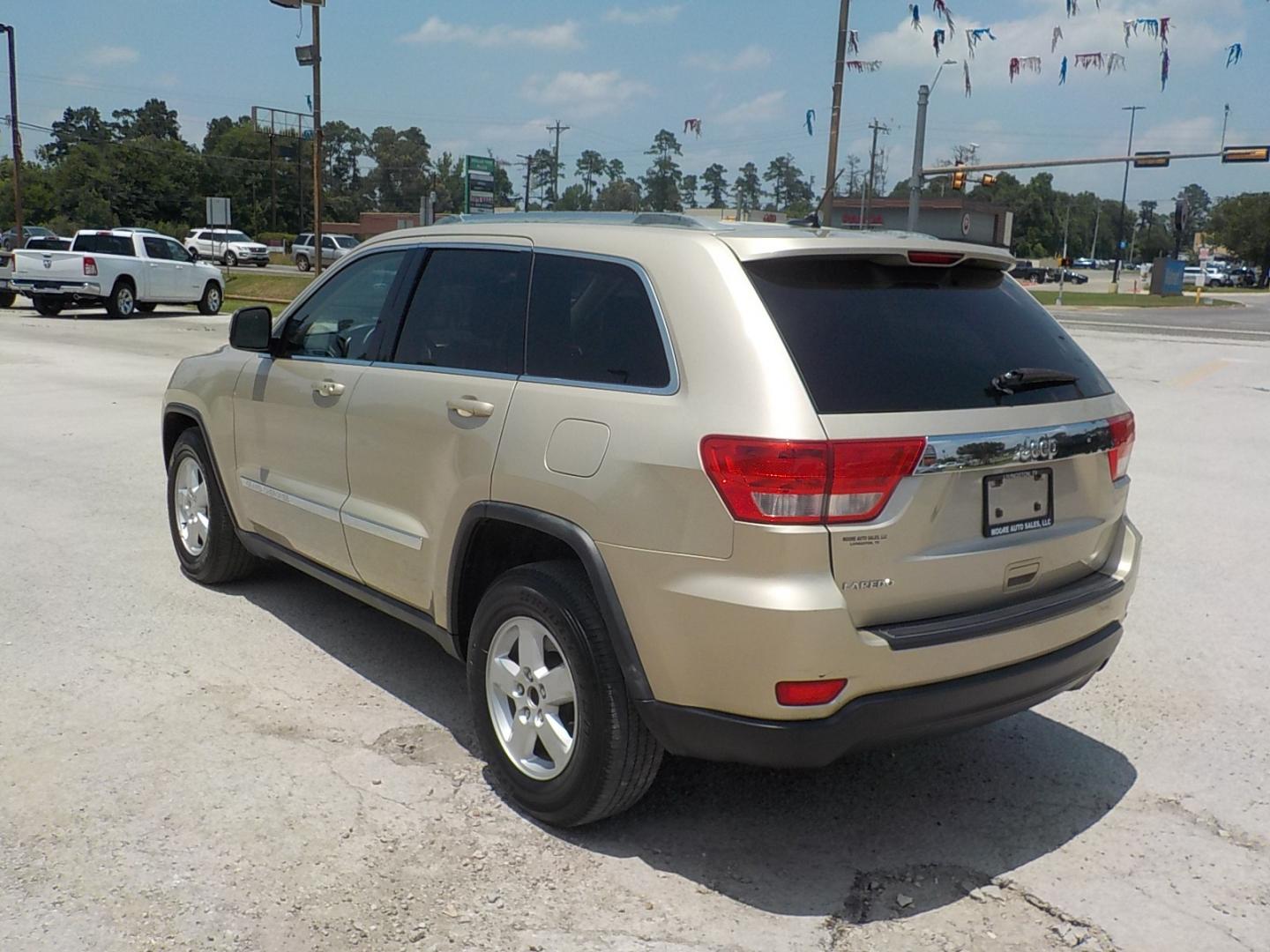 2011 Tan /Dk Gray Jeep Grand Cherokee Laredo 2WD (1J4RS4GG7BC) with an 3.6L V6 DOHC 24V engine, 5-Speed Automatic transmission, located at 1617 W Church Street, Livingston, TX, 77351, (936) 327-3600, 30.710995, -94.951157 - Local vehicle Serviced regularly! Come buy this one with confidence!! - Photo#5