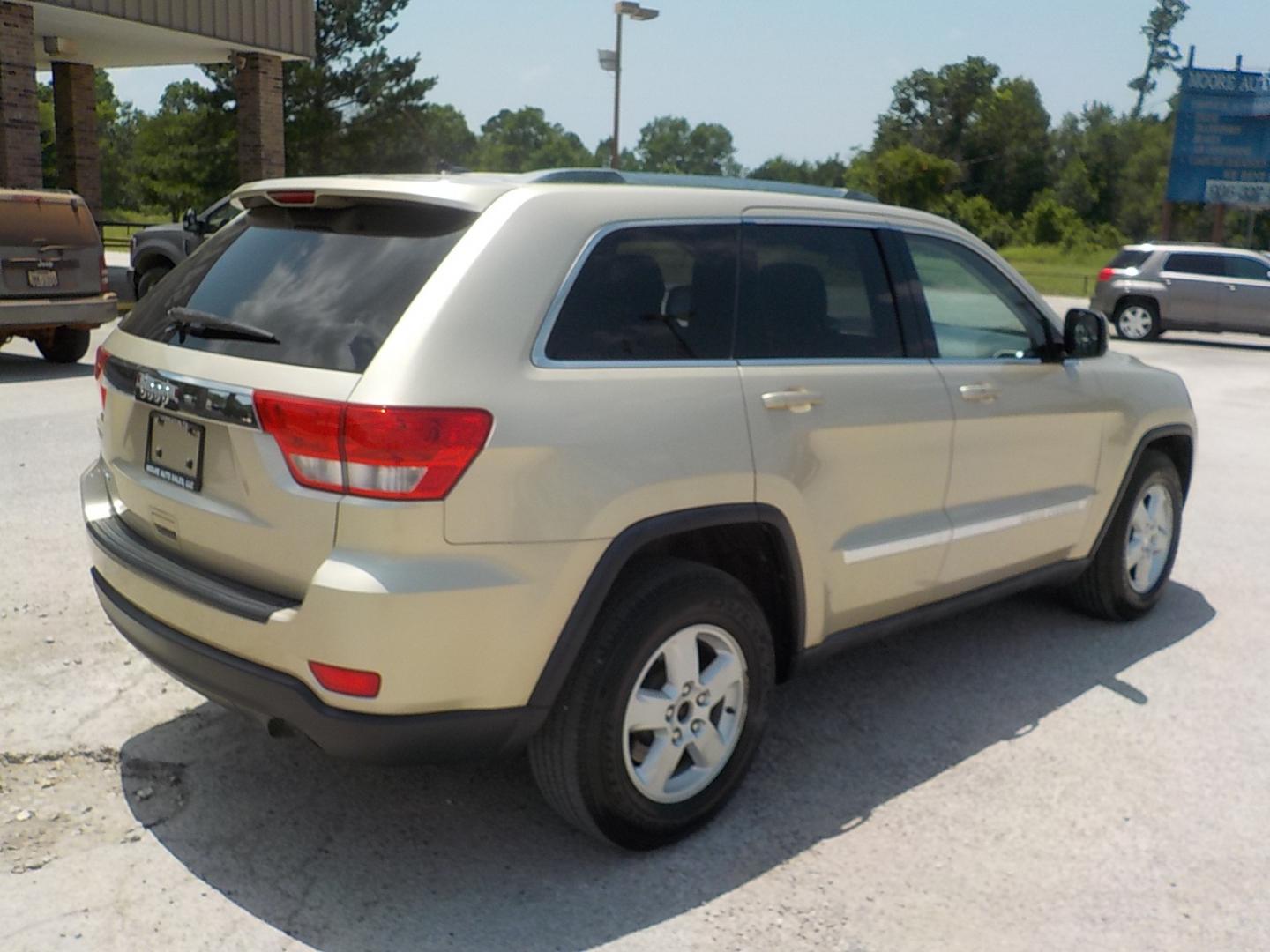 2011 Tan /Dk Gray Jeep Grand Cherokee Laredo 2WD (1J4RS4GG7BC) with an 3.6L V6 DOHC 24V engine, 5-Speed Automatic transmission, located at 1617 W Church Street, Livingston, TX, 77351, (936) 327-3600, 30.710995, -94.951157 - Local vehicle Serviced regularly! Come buy this one with confidence!! - Photo#6