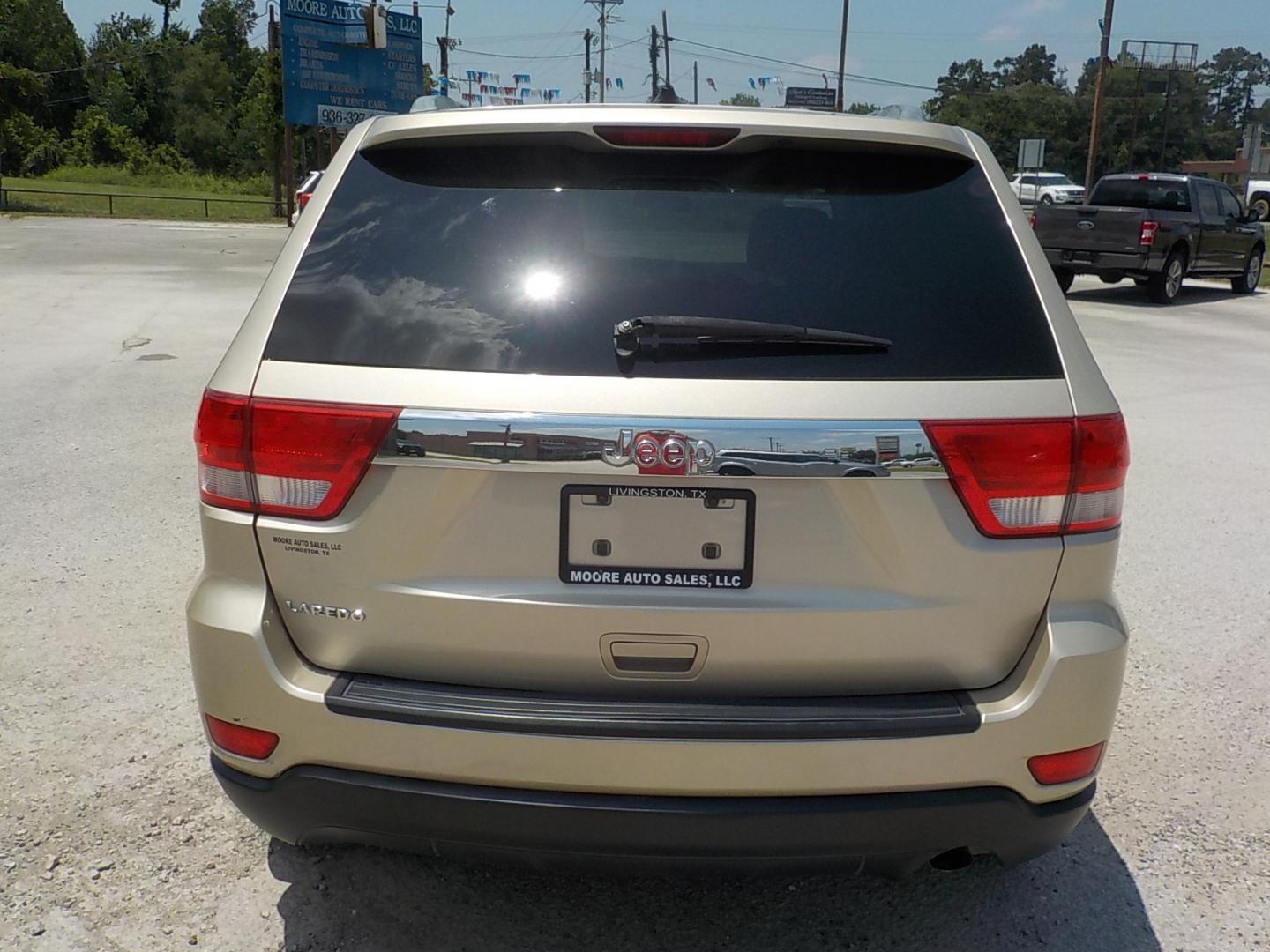 2011 Tan /Dk Gray Jeep Grand Cherokee Laredo 2WD (1J4RS4GG7BC) with an 3.6L V6 DOHC 24V engine, 5-Speed Automatic transmission, located at 1617 W Church Street, Livingston, TX, 77351, (936) 327-3600, 30.710995, -94.951157 - Local vehicle Serviced regularly! Come buy this one with confidence!! - Photo#7