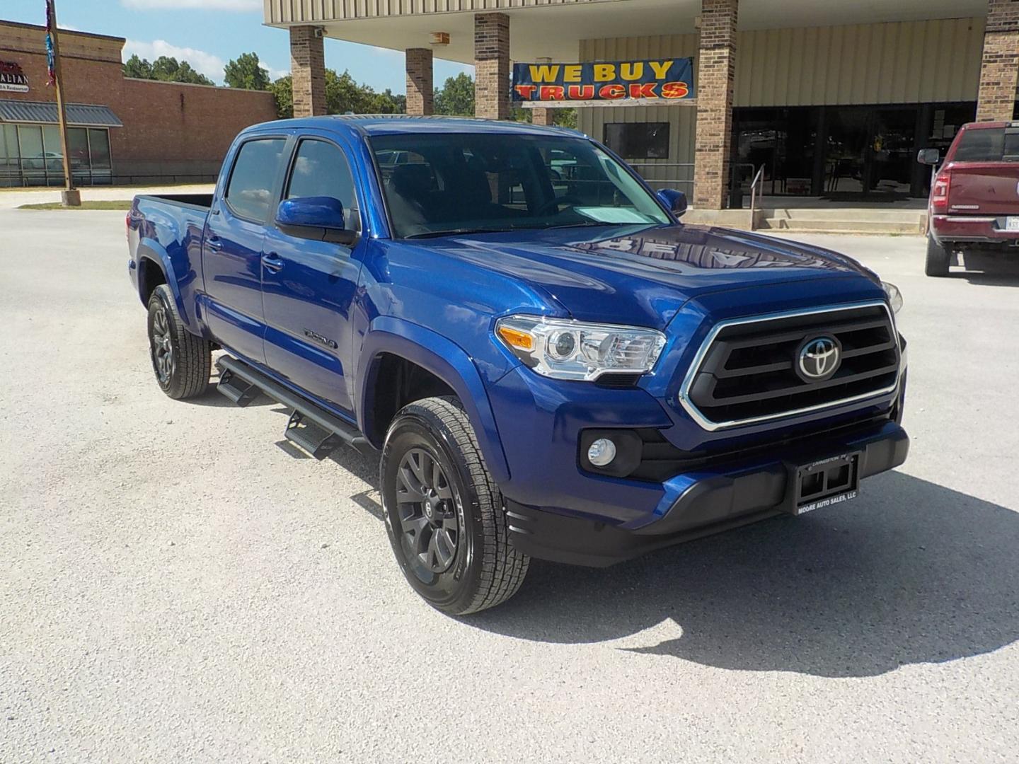 2023 Blue /Gray Toyota Tacoma SR5 Double Cab Super Long Bed V6 6AT 2WD (3TYBZ5DN6PT) with an 3.5L V6 DOHC 24V engine, 6A transmission, located at 1617 W Church Street, Livingston, TX, 77351, (936) 327-3600, 30.710995, -94.951157 - ONE OWNER!! LOW LOW MILES!! Hard to find LONG BED!! Come in and we'll tell you the whole story on this truck. This one shouldn't last long!! - Photo#1