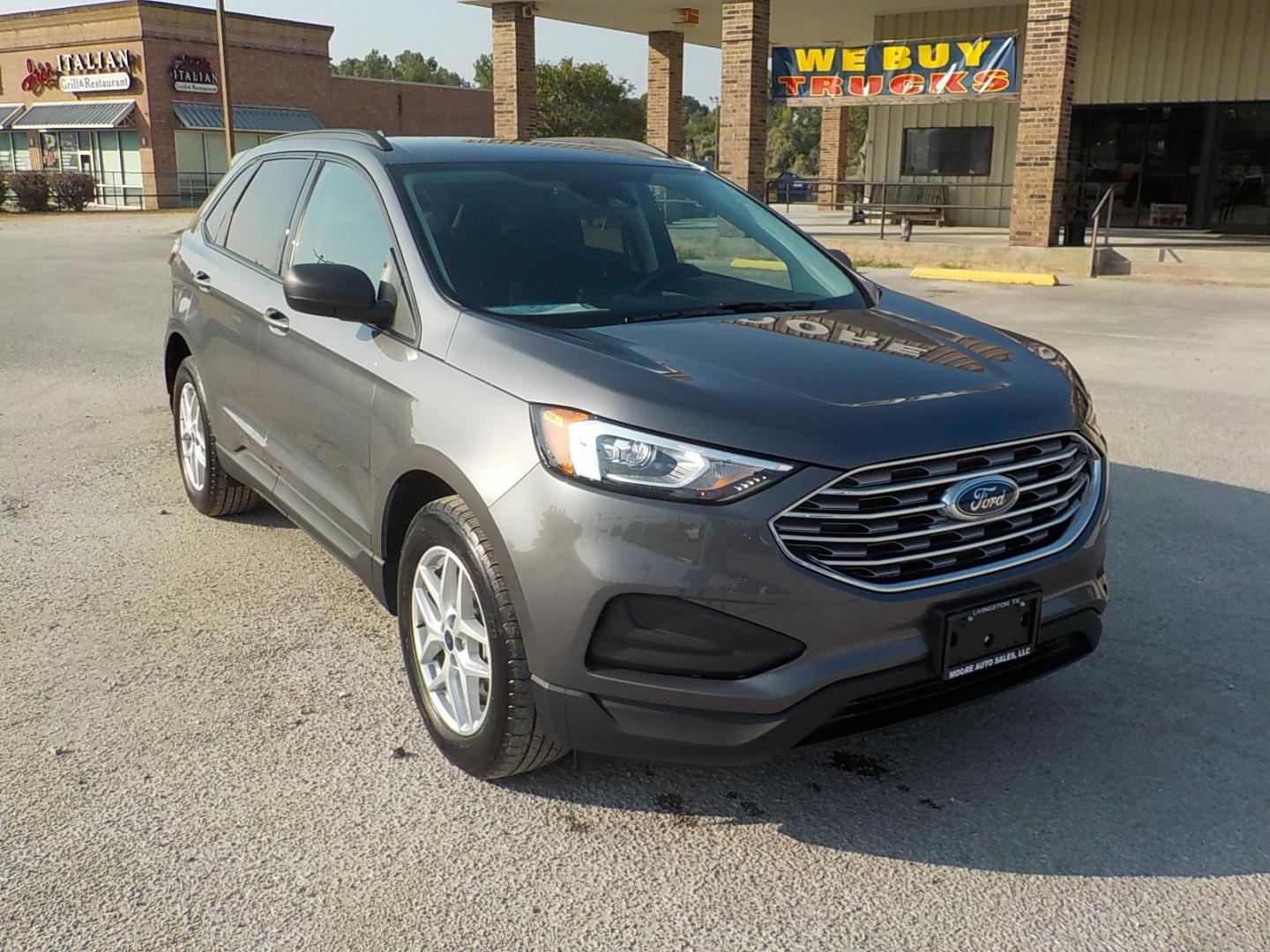 2022 Gray /Black Ford Edge SE AWD (2FMPK4G96NB) with an 2.0L L4 DOHC 16V engine, 6A transmission, located at 1617 W Church Street, Livingston, TX, 77351, (936) 327-3600, 30.710995, -94.951157 - LOW MILES!! ONE OWNER!! - Photo#1