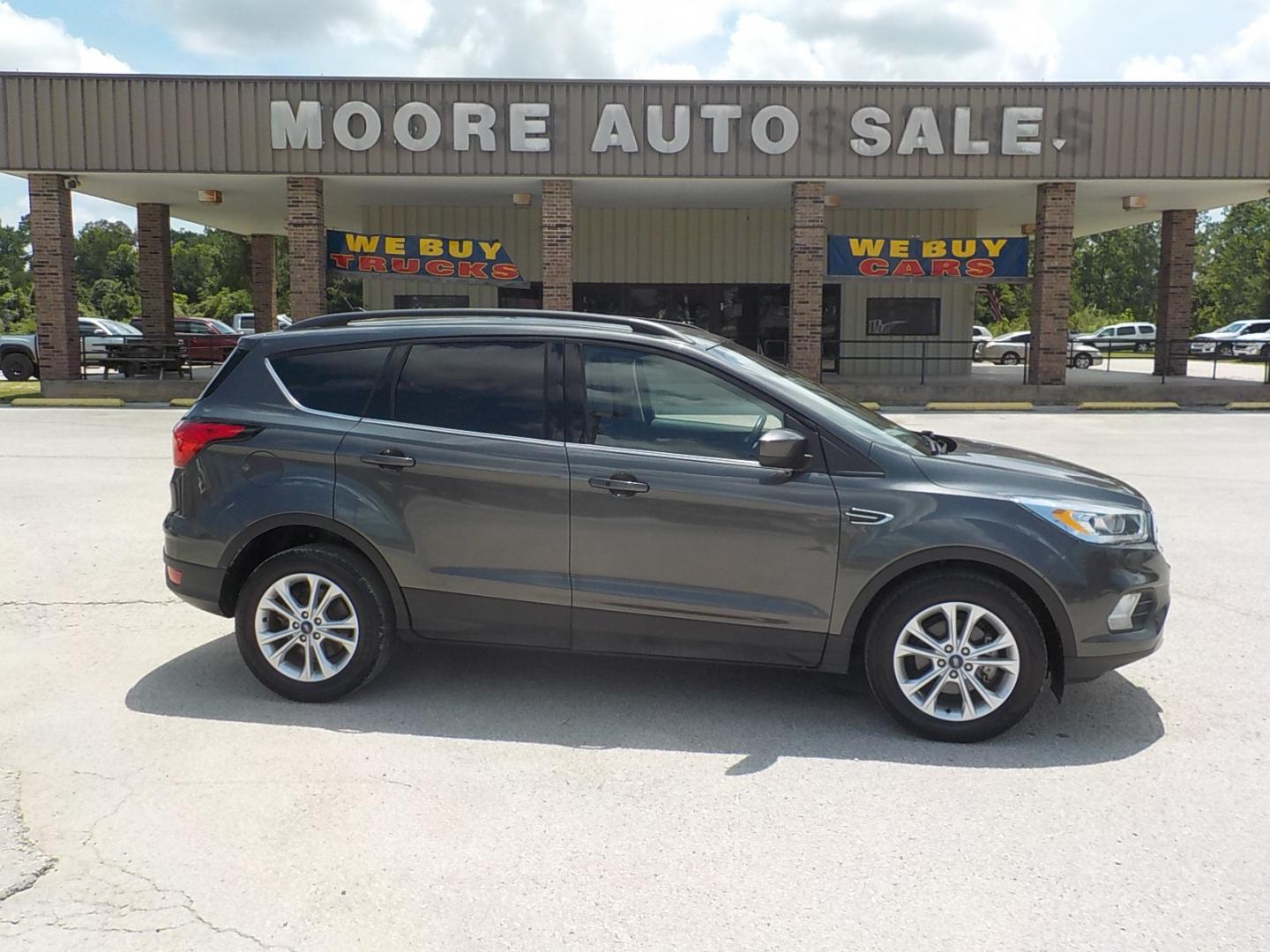 2019 Gray Ford Escape (1FMCU0HD4KU) , Automatic transmission, located at 1617 W Church Street, Livingston, TX, 77351, (936) 327-3600, 30.710995, -94.951157 - These vehicles get excellent fuel mileage and will carry a family to boot! - Photo#0