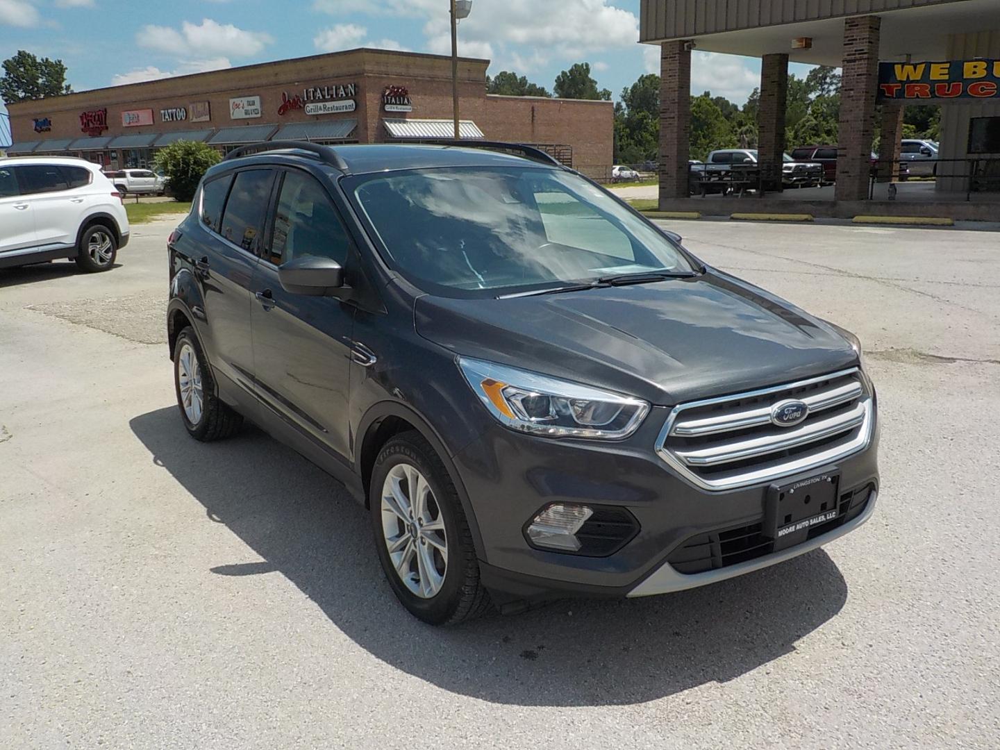 2019 Gray Ford Escape (1FMCU0HD4KU) , Automatic transmission, located at 1617 W Church Street, Livingston, TX, 77351, (936) 327-3600, 30.710995, -94.951157 - These vehicles get excellent fuel mileage and will carry a family to boot! - Photo#1