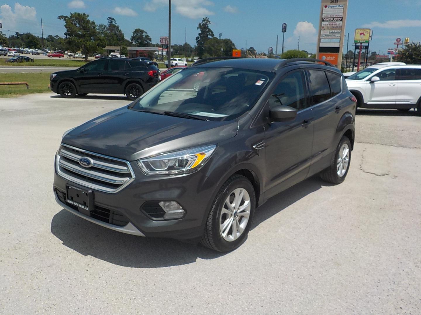 2019 Gray Ford Escape (1FMCU0HD4KU) , Automatic transmission, located at 1617 W Church Street, Livingston, TX, 77351, (936) 327-3600, 30.710995, -94.951157 - These vehicles get excellent fuel mileage and will carry a family to boot! - Photo#2