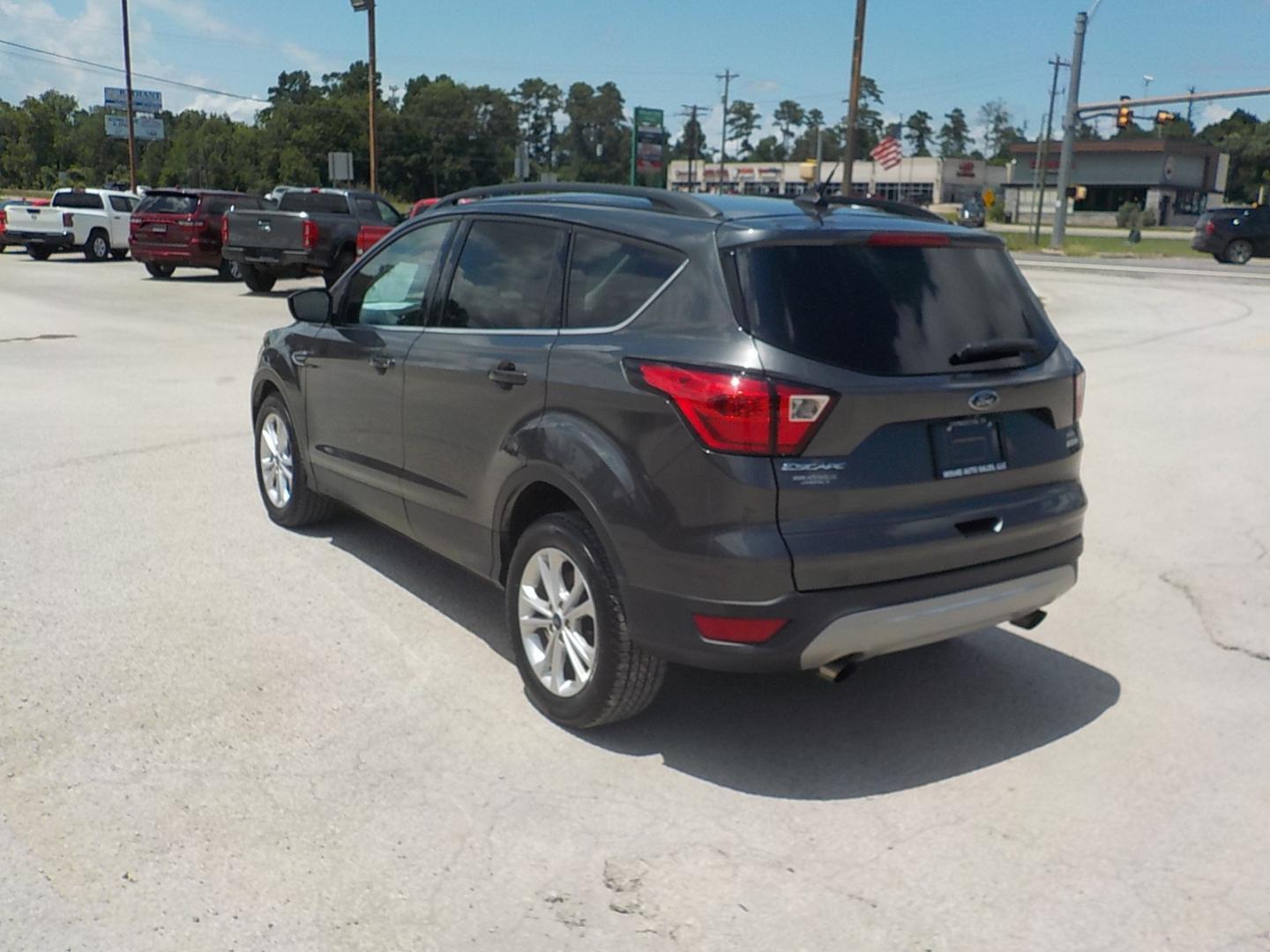 2019 Gray Ford Escape (1FMCU0HD4KU) , Automatic transmission, located at 1617 W Church Street, Livingston, TX, 77351, (936) 327-3600, 30.710995, -94.951157 - These vehicles get excellent fuel mileage and will carry a family to boot! - Photo#4