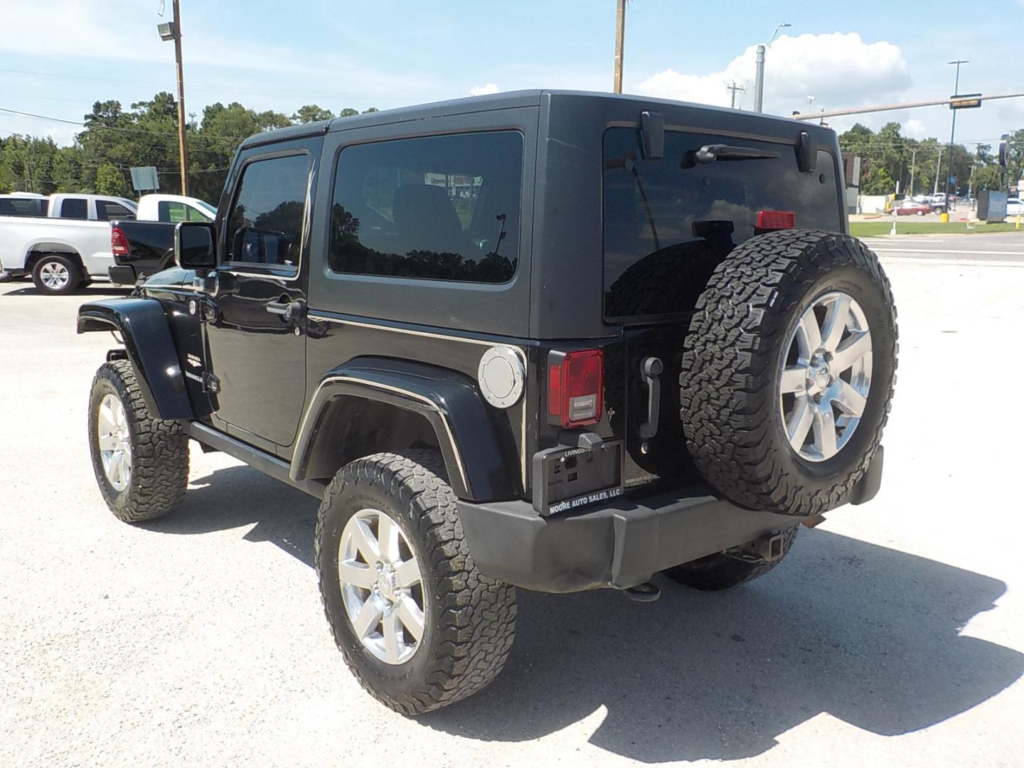 2013 Jeep Wrangler Sahara 4WD (1C4AJWBG2DL) with an 3.6L V6 DOHC 24V FFV engine, Automatic transmission, located at 1617 W Church Street, Livingston, TX, 77351, (936) 327-3600, 30.710995, -94.951157 - Deer season is right around the corner and this one is perfect for that, yet nice enough to sport around town!! - Photo#5