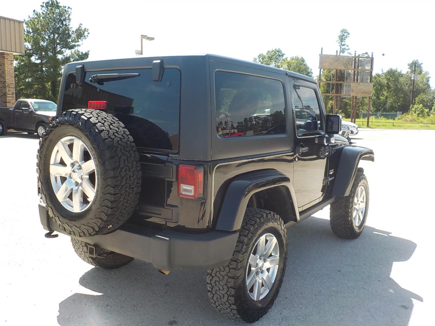 2013 Jeep Wrangler Sahara 4WD (1C4AJWBG2DL) with an 3.6L V6 DOHC 24V FFV engine, Automatic transmission, located at 1617 W Church Street, Livingston, TX, 77351, (936) 327-3600, 30.710995, -94.951157 - Deer season is right around the corner and this one is perfect for that, yet nice enough to sport around town!! - Photo#7