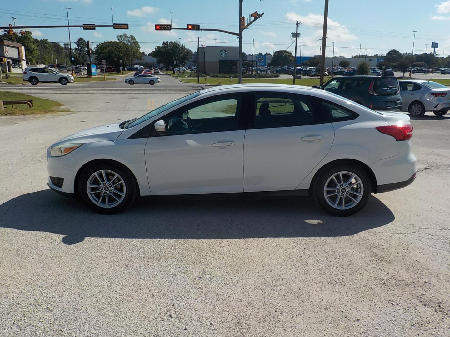 2016 Ford Focus SE Sedan (1FADP3F25GL) with an 2.0L L4 DOHC 16V engine, Automatic transmission, located at 1617 W Church Street, Livingston, TX, 77351, (936) 327-3600, 30.710995, -94.951157 - Affordable ride with excellent economy!! - Photo#4