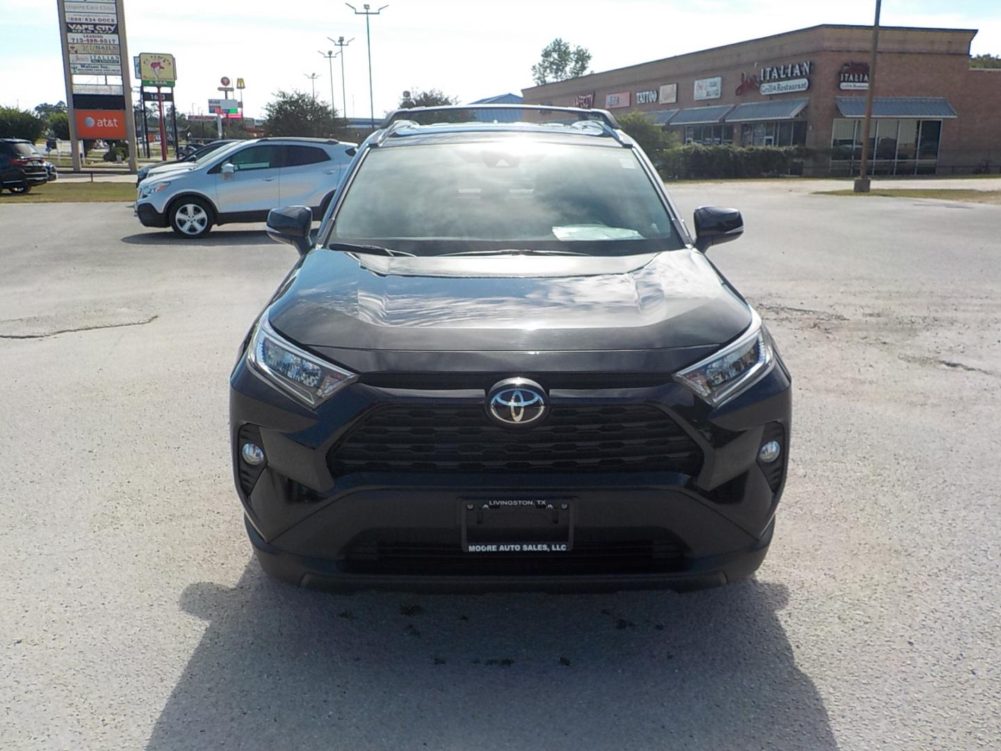 2021 Black /Gray Toyota RAV4 XLE (2T3W1RFV4MW) with an 2.5L L4 DOHC 16V engine, 8A transmission, located at 1617 W Church Street, Livingston, TX, 77351, (936) 327-3600, 30.710995, -94.951157 - ONE OWNER!! LOW LOW MILES!! Yes, that is the correct miles! Bought this one off the street from the original owner; he just got to the point he didn't need to drive. No fault of the vehicle - Photo#2