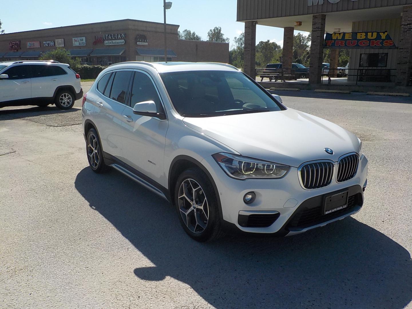 2018 White /Gray BMW X1 xDrive28i (WBXHT3C30J5) with an 2.0L L4 DOHC 16V engine, 8A transmission, located at 1617 W Church Street, Livingston, TX, 77351, (936) 327-3600, 30.710995, -94.951157 - ONE OWNER!! LOW MILES!! Come check this one out!! - Photo#1