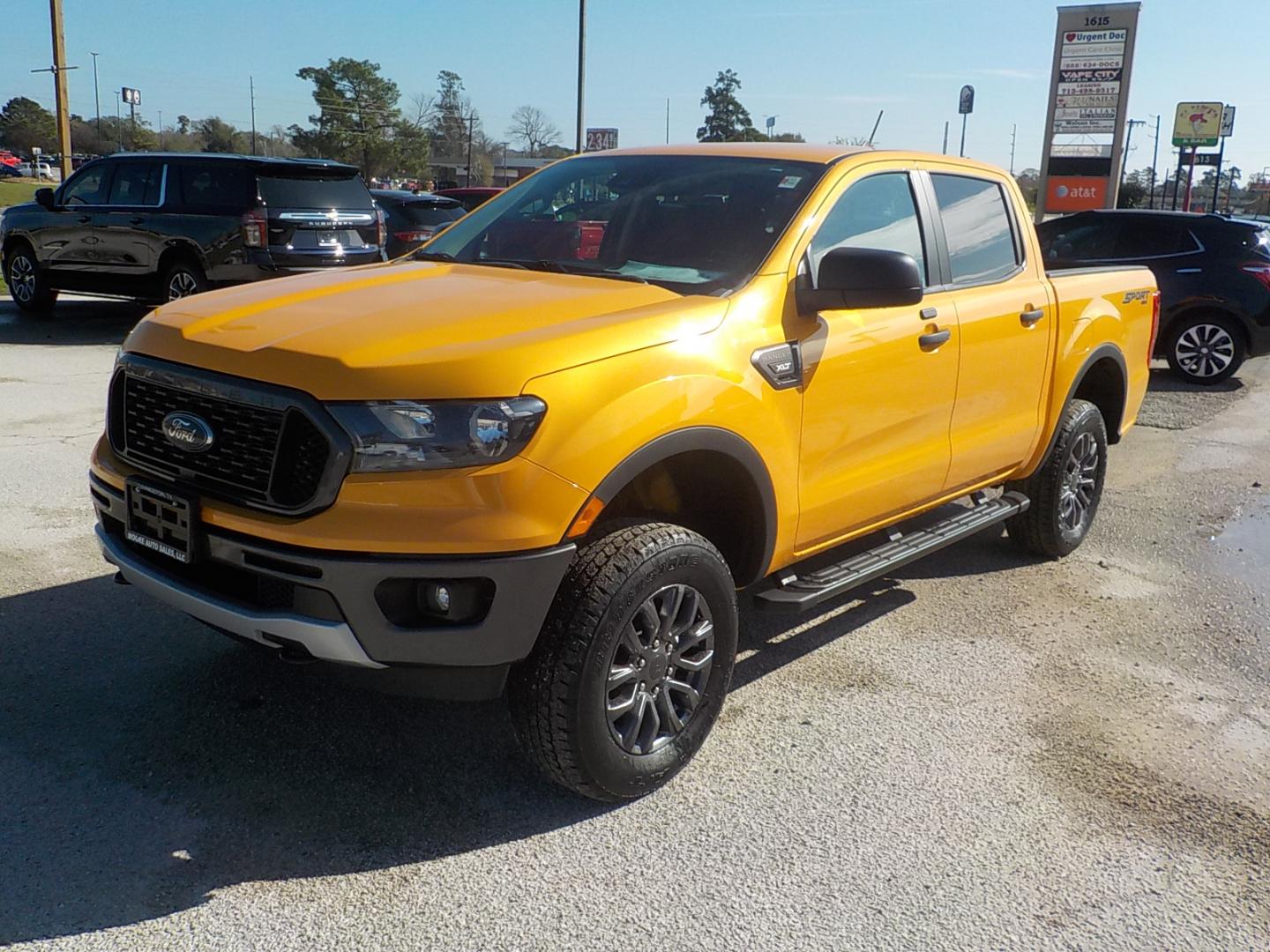 2021 Yellow /Black Ford Ranger XL SuperCrew 4WD (1FTER4FH6ML) with an 2.3L L4 DOHC 16V engine, 10A transmission, located at 1617 W Church Street, Livingston, TX, 77351, (936) 327-3600, 30.710995, -94.951157 - LOW LOW MILES!! TALK ABOUT FLASHY!! - Photo#4