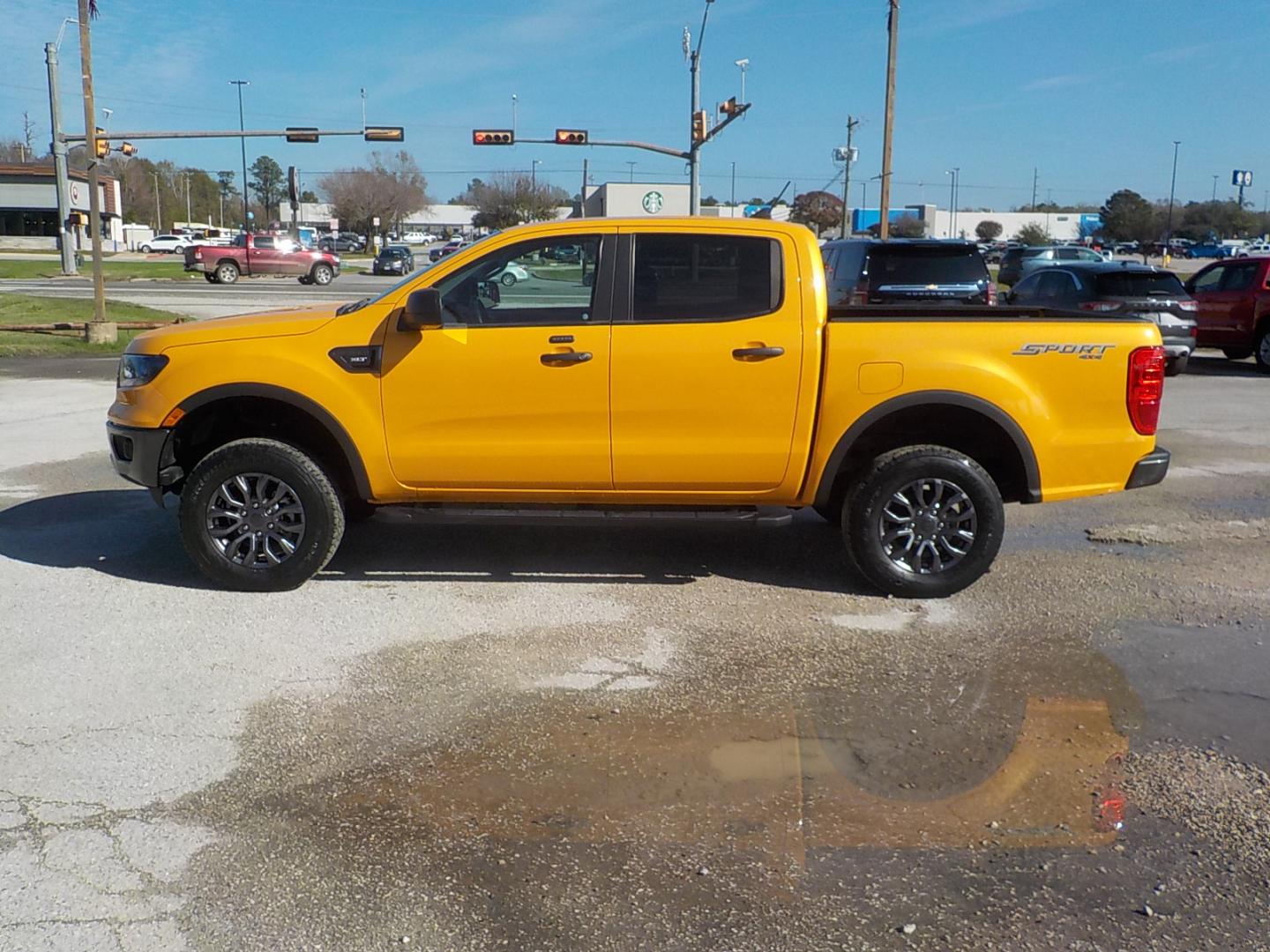 2021 Yellow /Black Ford Ranger XL SuperCrew 4WD (1FTER4FH6ML) with an 2.3L L4 DOHC 16V engine, 10A transmission, located at 1617 W Church Street, Livingston, TX, 77351, (936) 327-3600, 30.710995, -94.951157 - LOW LOW MILES!! TALK ABOUT FLASHY!! - Photo#2